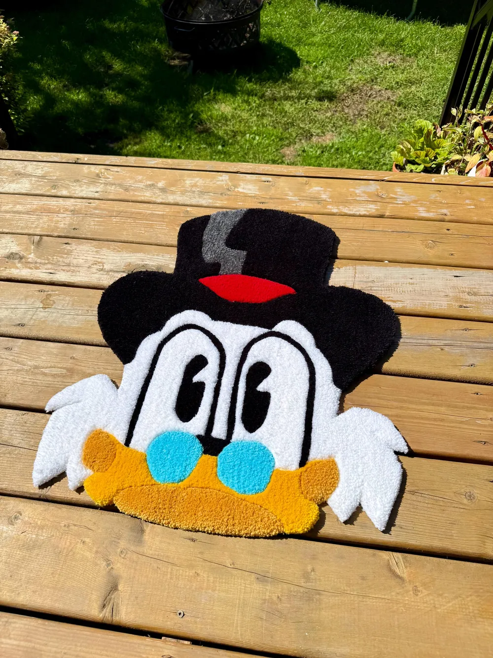 Tapis tufté Picsou au chapeau haut-de-forme